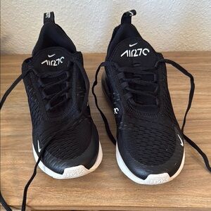 Nike Black and White Athletic Shoes with Breathable Design